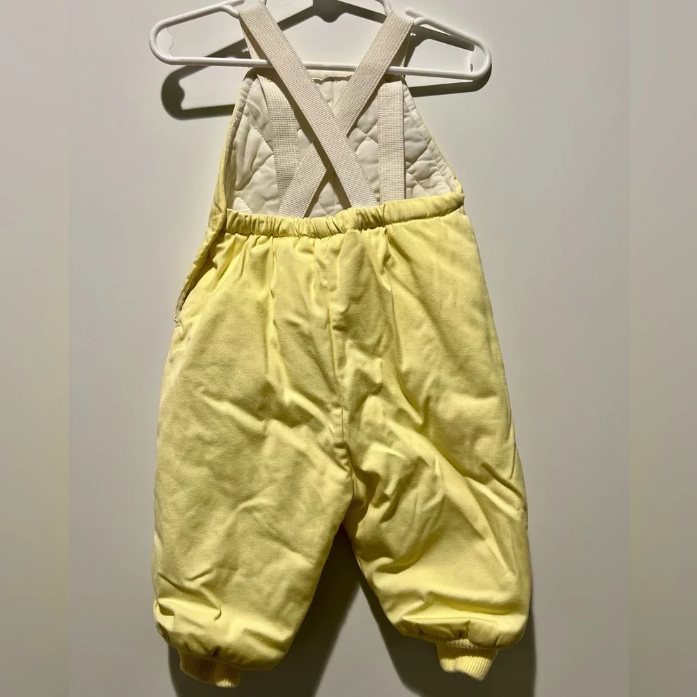 Vintage yellow two-piece baby snowsuit by Playland featuring embroidered giraffe